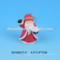Muñeca colgante de la Navidad de cerámica al por mayor directa de la fábrica con las estatuillas de Papá Noel